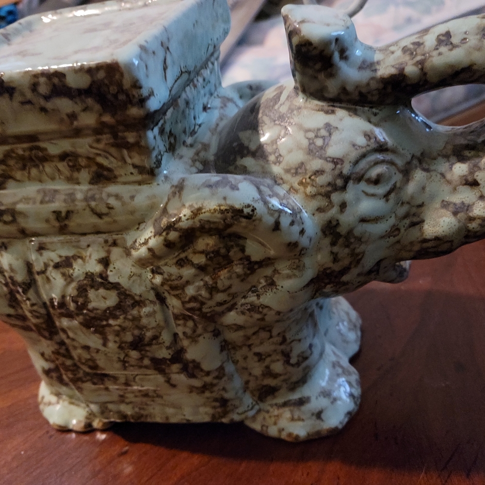 Large elephant plant stand and artillery